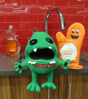 BAC, the Partnership mascot, and Mitty, the Family Meals spokesmitt, encourage families to eat one more meal each week and to use safe food preparation techniques