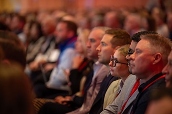 People paying attention at a conference.