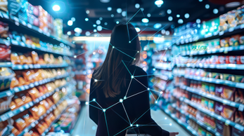 Woman in grocery store with interconnectivity line overlay