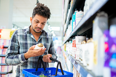 Shopper purchasing shampoo